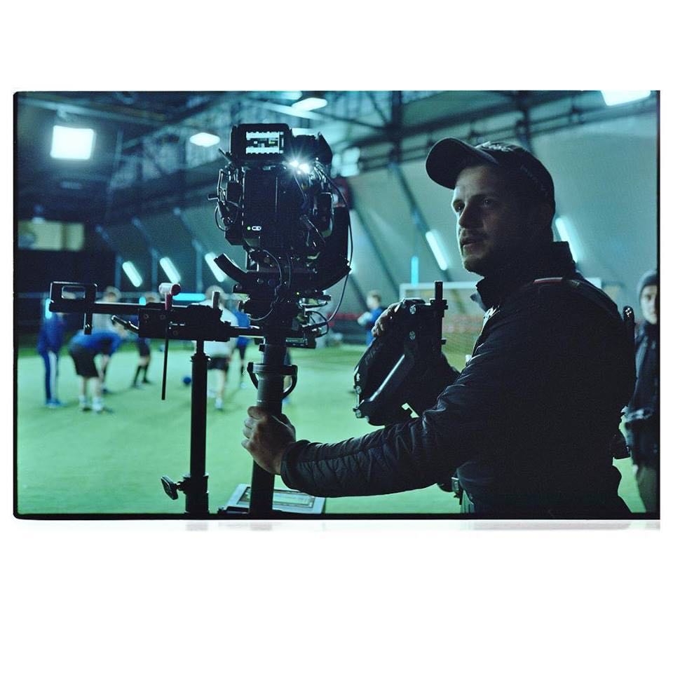 Adam Mendry operating a Steadicam on set