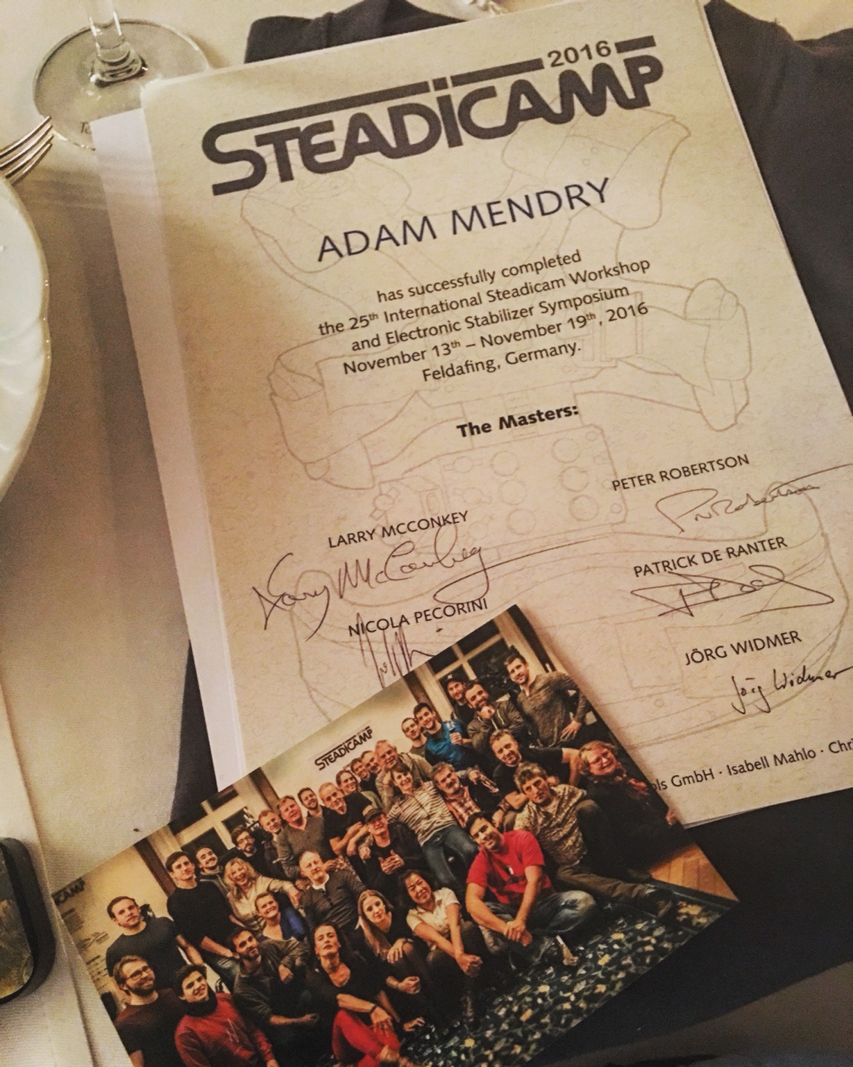 Adam Mendry's certificate and group photograph from Steadicamp 2016